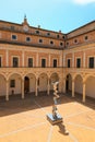 Urbino, Italy - August 9, 2017: The Castle of the Dukes of Urbino. Elliptical Column, the steel column made by British artist Tony