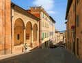 Urbino, Italy - August 9, 2017: A small street in the old town of Urbino. sunny day. Royalty Free Stock Photo