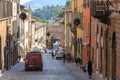 Urbino, Italy - August 9, 2017: A small street in the old town of Urbino. sunny day. Royalty Free Stock Photo