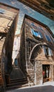 Urbino, Italy - August 9, 2017: A small street in the old town of Urbino. sunny day Royalty Free Stock Photo