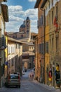 Urbino, Italy - August 9, 2017: A small street in the old town of Urbino. sunny day Royalty Free Stock Photo