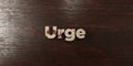Urge - grungy wooden headline on Maple - 3D rendered royalty free stock image