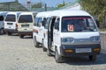 Route minibuses of Chevrolet Damas waiting for passengers on the bus station