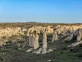 Urgup fairy chimneys, tourism symbol of Turkey, stone houses, timeless places, vacation and life Royalty Free Stock Photo