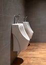 Urinal in toilet. Urinal in restroom space Royalty Free Stock Photo