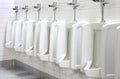 Urinals in public toilet Royalty Free Stock Photo