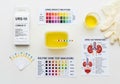 Urine analysis setup featuring a URS-10 Combur 10 test kit and Royalty Free Stock Photo
