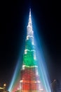 Urj Khalifa Tower floodlit in the white, green and red colours