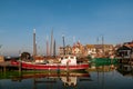 Urk Flevoland Netherlands a sunny spring day at the old village of Urk with fishing boats at the harbor