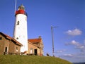 The light house of Urk Netherlands alongside the lake Ijselmeer