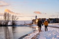 Urk Netherlands lighthouse during winter with snow covered coastline, Urk view at the lighthouse snowy landscape winter Royalty Free Stock Photo