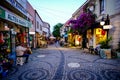 Urla, izmir, Turkey - June, 2023: Souvenir shops, cafes and people in Urla art street in izmir, Turkey.