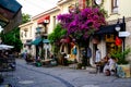 Urla, izmir, Turkey - June, 2023: Souvenir shops, cafes and people in Urla art street in izmir, Turkey.