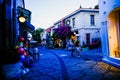 Urla, izmir, Turkey - June, 2023: Souvenir shops, cafes and people in Urla art street in izmir, Turkey.