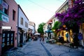 Urla, izmir, Turkey - June, 2023: Souvenir shops, cafes and people in Urla art street in izmir, Turkey