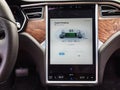 Urmond, NETHERLANDS - MAY 31, 2018: Dashboard. Large display with infographics. Tesla Moles S 100D, Tesla supercharge station with