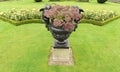 Urn in garden Royalty Free Stock Photo