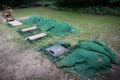 urn graves lined with green mats Royalty Free Stock Photo