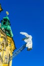 Ursulinenkirche church situated on the Landstrasse street in the Austrian city Linz with a sculpture of white angel Royalty Free Stock Photo