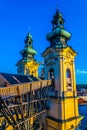 Ursulinenkirche church situated on the Landstrasse street in the Austrian city Linz with a sculpture of white angel Royalty Free Stock Photo