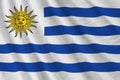 Uruguay flag with big folds waving close up under the studio light indoors. The official symbols and colors in banner