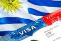 Uruguay immigration visa. Closeup Visa to Uruguay focusing on word VISA, 3D rendering. Travel or migration to Uruguay destination Royalty Free Stock Photo