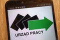 Urzad Pracy logo displayed on a modern smartphone