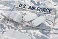 US AIR FORCE branch tape and dog tags on digital tiger-stripe pattern Airman Battle Uniform ABU Royalty Free Stock Photo