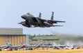 US Air Force F-15C Eagle fighter jet from 159th Fighter Wing taking off from Hohn Airbase during NATO exercise Air Defender 2023. Royalty Free Stock Photo