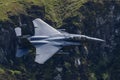 F-15E Strike Eagle flying through the Mach Loop Royalty Free Stock Photo