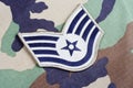 US AIR FORCE Staff Sergeant rank patch on woodland camouflage uniform Royalty Free Stock Photo