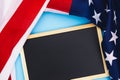 US American flag with blackboard on blue background. For USA Memorial day,  Memorial day, Presidents day, Veterans day, Labor day Royalty Free Stock Photo