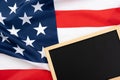 US American flag with blackboard on white background. For USA Memorial day, Presidents day, Veterans day, Labor day, Independence Royalty Free Stock Photo