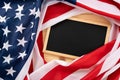 US American flag with blackboard on wooden background. For USA Memorial day, Presidents day, Veterans day, Labor day, Independence Royalty Free Stock Photo