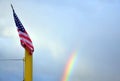US/American Flag- Old Glory in front of rainbow Royalty Free Stock Photo