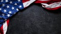 US American flag on worn black background. For USA Memorial day, Veteran`s day, Labor day, or 4th of July celebration. With blank