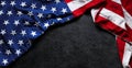 US American flag on worn black background. For USA Memorial day, Veteran`s day, Labor day, or 4th of July celebration. With blank Royalty Free Stock Photo