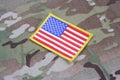 US ARMY flag patch on camouflage uniform