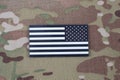 US ARMY flag patch on camouflage uniform