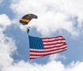 US Army Golen Night Paratrooper with a large American Flag Royalty Free Stock Photo