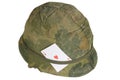 US Army helmet Vietnam war period with amulet ace of hearts playing card Royalty Free Stock Photo