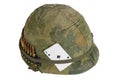 US Army helmet Vietnam war period with camouflage cover and ammo belt and amulet the ace of spades playing card Royalty Free Stock Photo