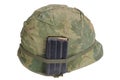 US Army helmet Vietnam war period with camouflage cover, magazine with ammo Royalty Free Stock Photo