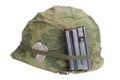 US Army helmet Vietnam war period with camouflage cover, magazine with ammot and dog tags Royalty Free Stock Photo