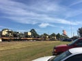 US Army trucks on railroad being transported by rail