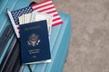 US citizen passport, American flag and dollars lie on baggage for travel Royalty Free Stock Photo