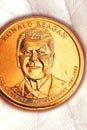 US coin lies on the palm. Obverse coins featuring President Reagan. American political system, presidential elections. Republican Royalty Free Stock Photo
