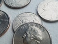 US currency Liberty quarter and other coins from closeup Royalty Free Stock Photo