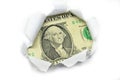US currency peeking through white paper.