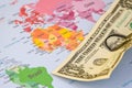 US dollar banknotes on globe world map, American investment and trading Royalty Free Stock Photo